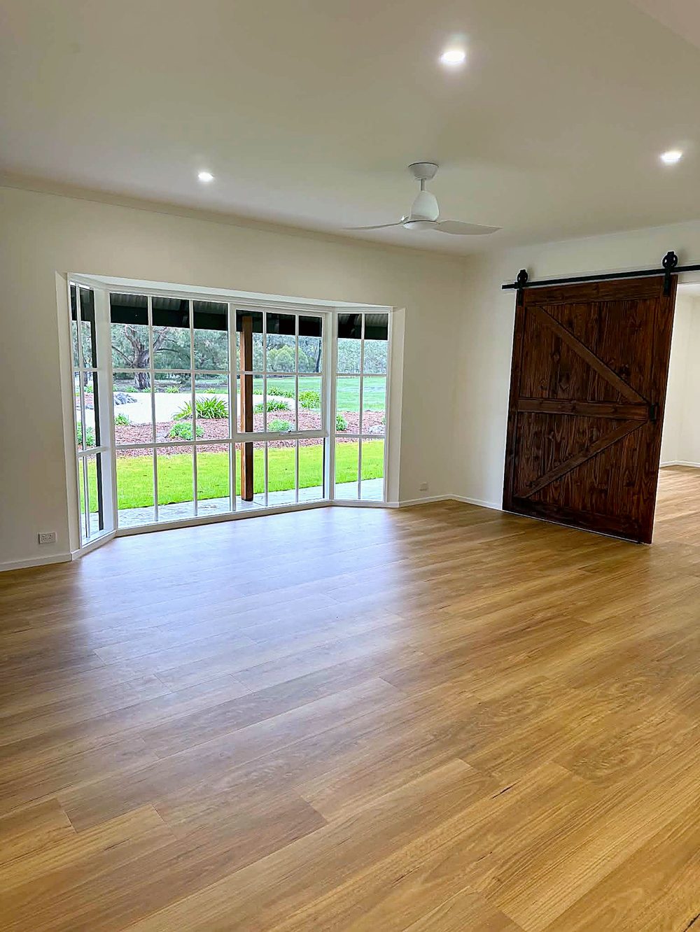 Barn-style living room — edited listing photo